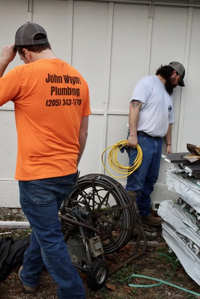 Slide of John Wayne Plumbing