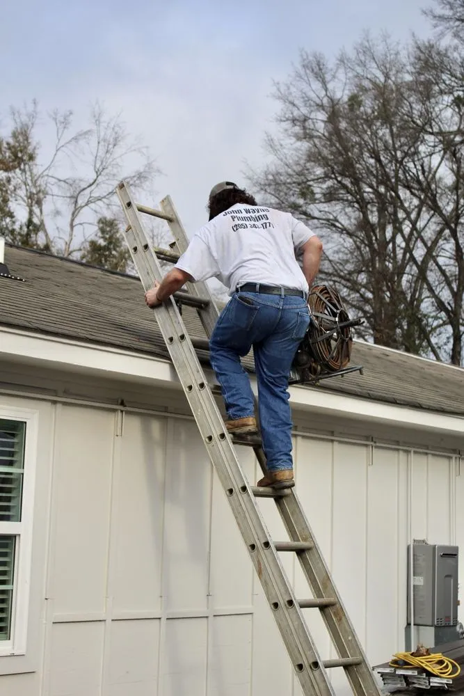Slide of John Wayne Plumbing