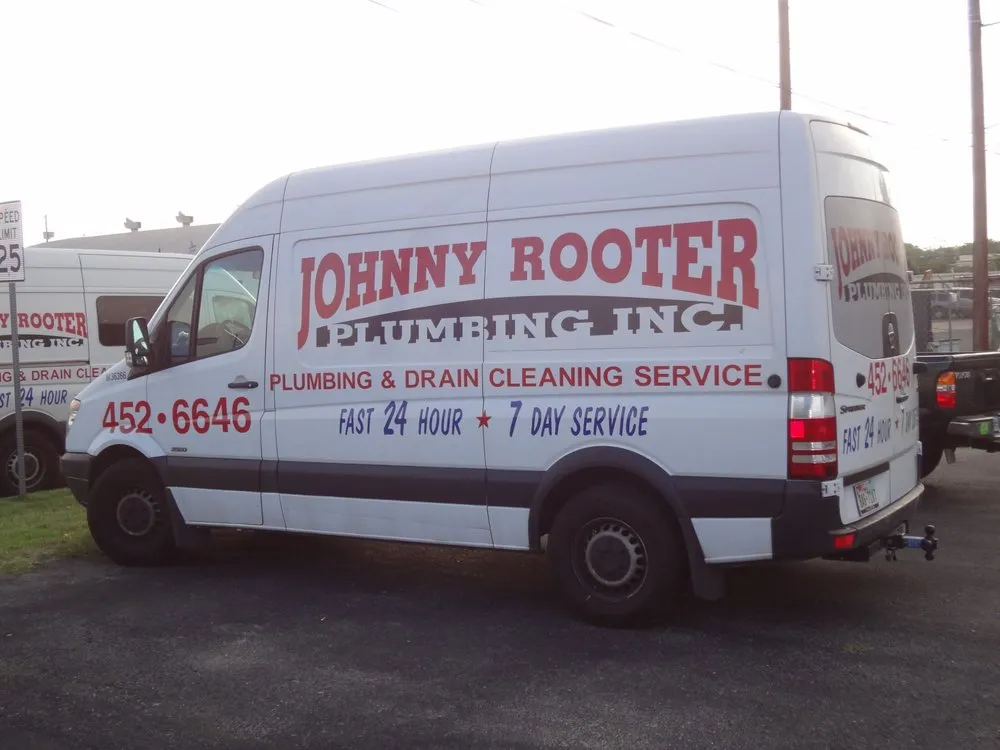 Slide of Johnny Rooter Plumbing