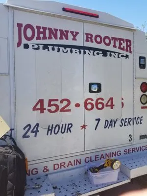 Johnny Rooter Plumbing Logo