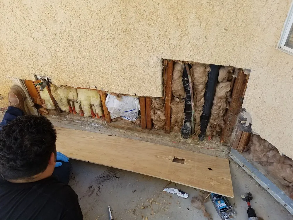 Slide of Johnny's Plumbing and Rooter