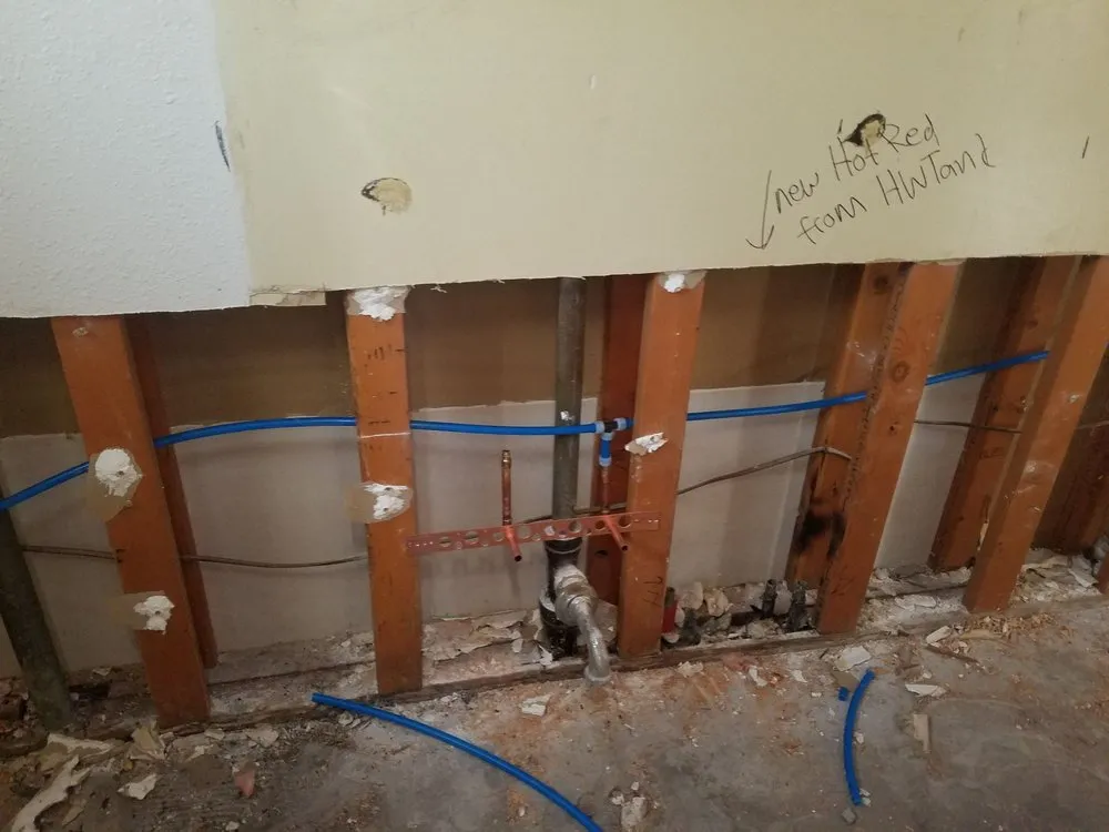 Slide of Johnny's Plumbing and Rooter