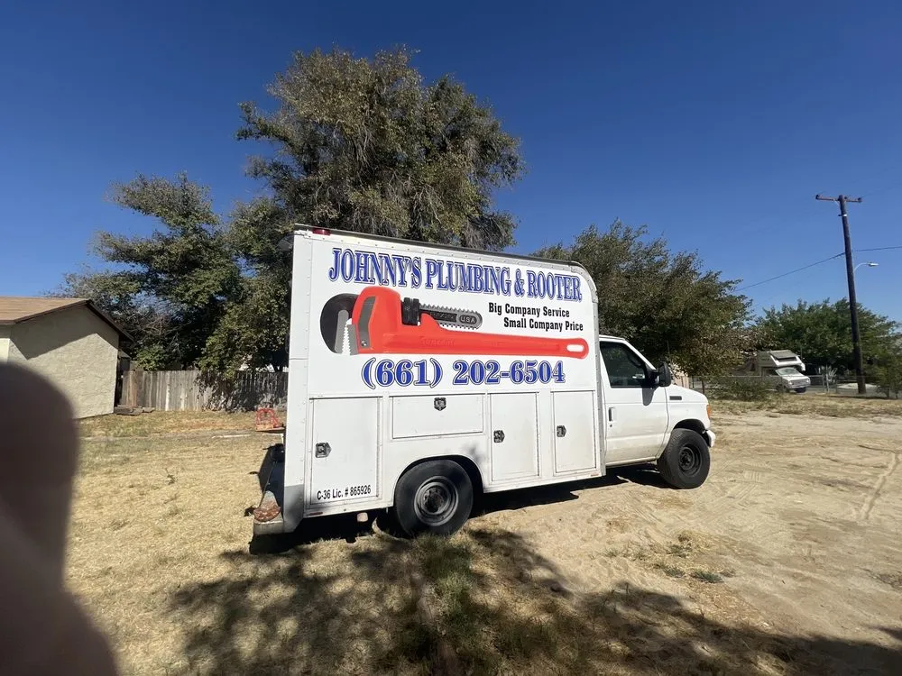 Slide of Johnny's Plumbing and Rooter