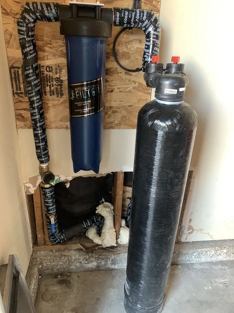 Slide of Johnny's Plumbing and Rooter