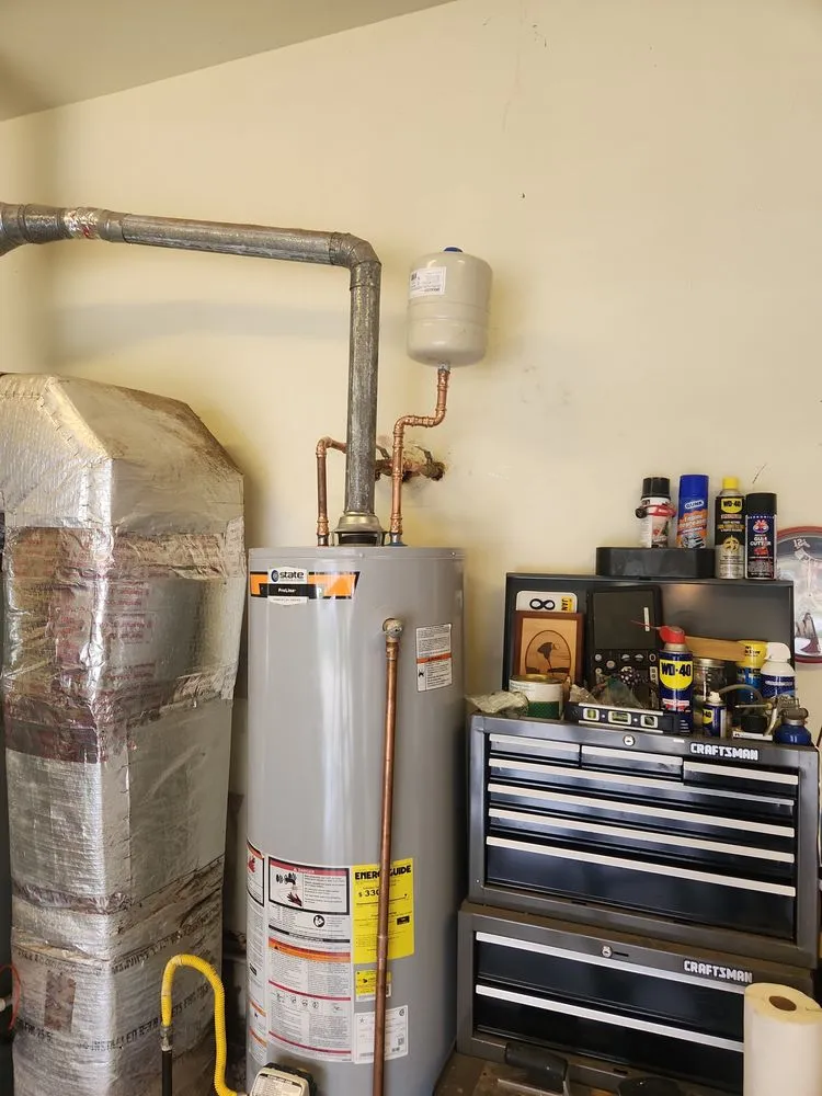 Slide of John's Drain Cleaning and Plumbing Services