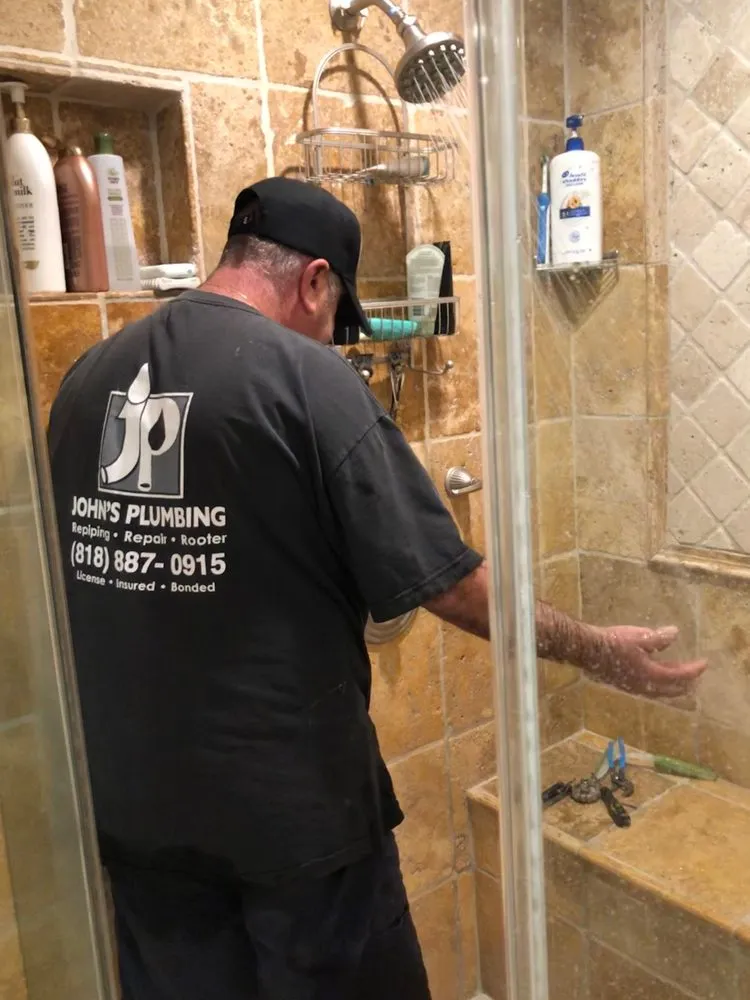 Slide of John's Plumbing & Rooter