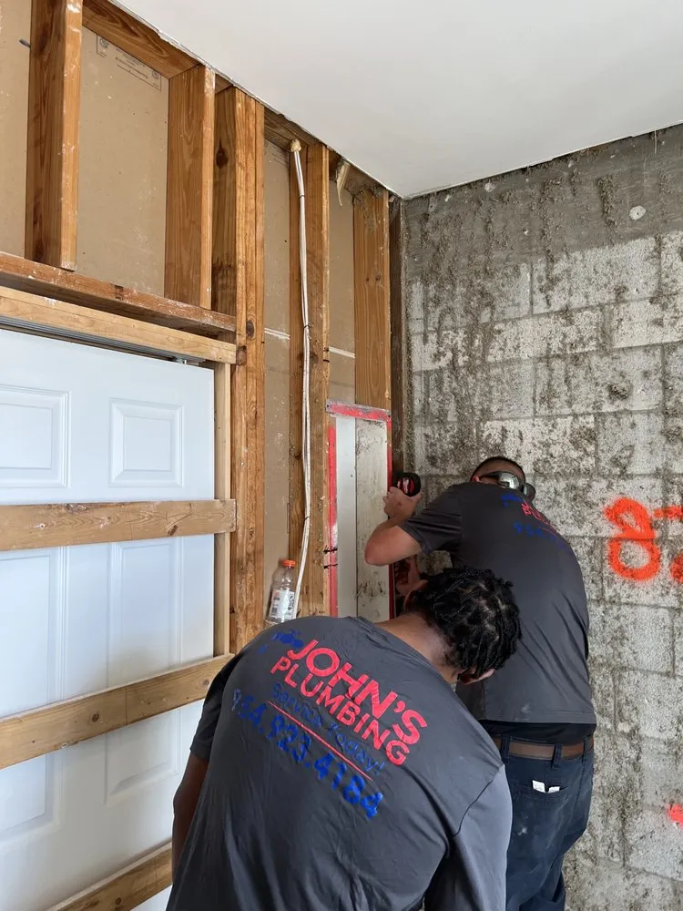 Slide of John's Plumbing