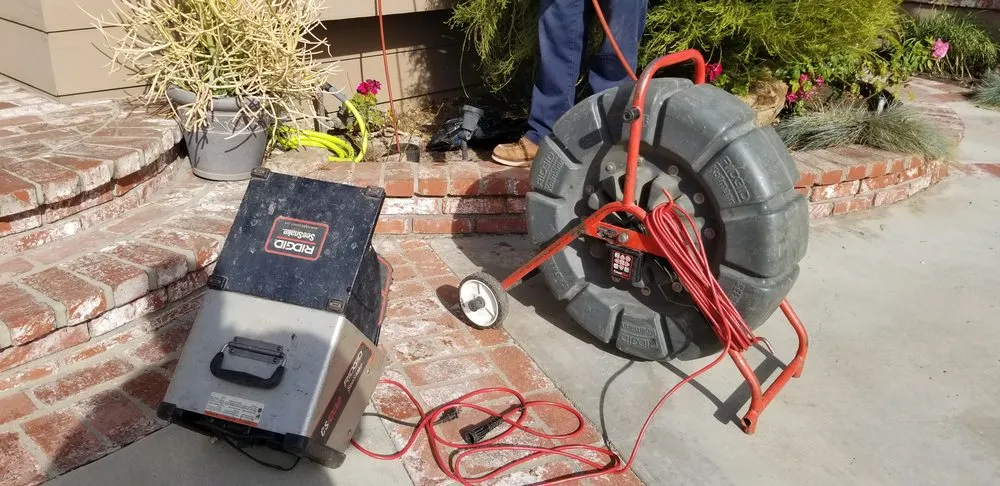 Slide of John's Rooter & Plumbing Service