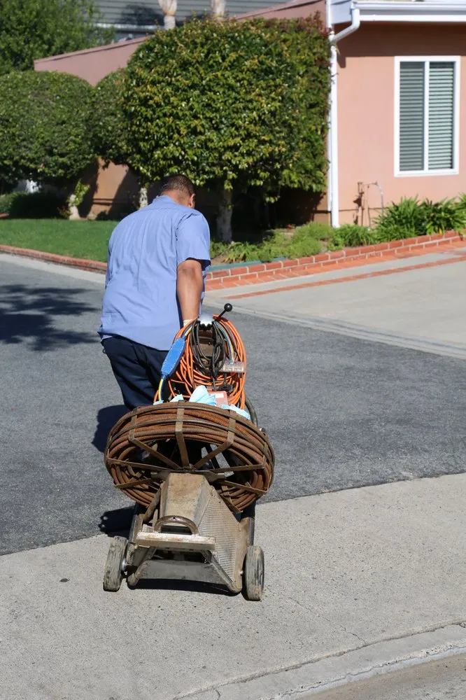 Slide of John's Rooter & Plumbing Service