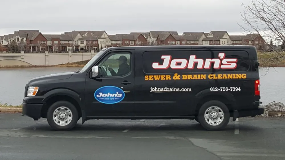 Slide of John's Sewer and Drain Cleaning