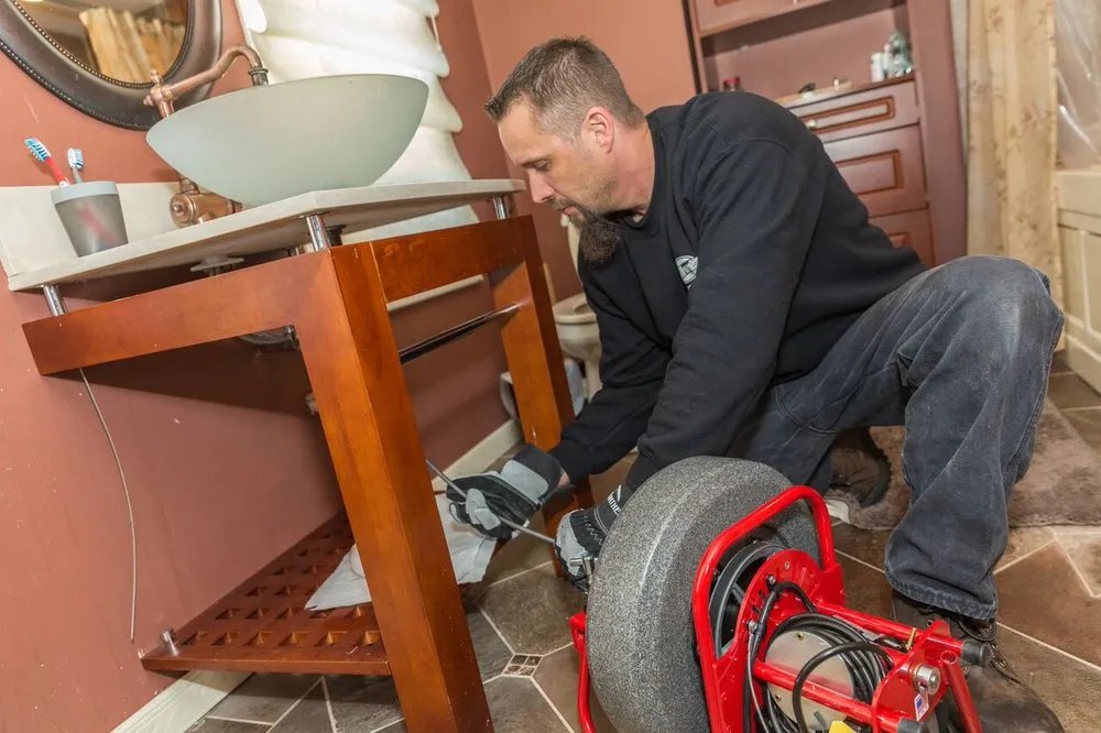 Slide of John's Sewer and Drain Cleaning