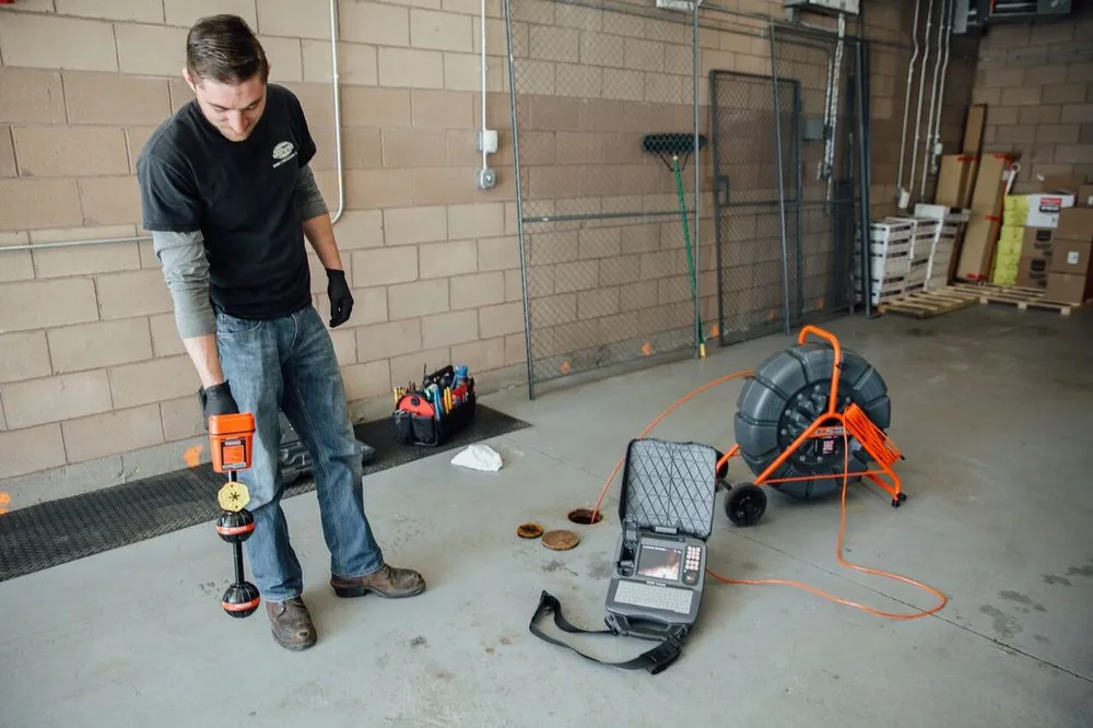 Slide of John's Sewer and Drain Cleaning