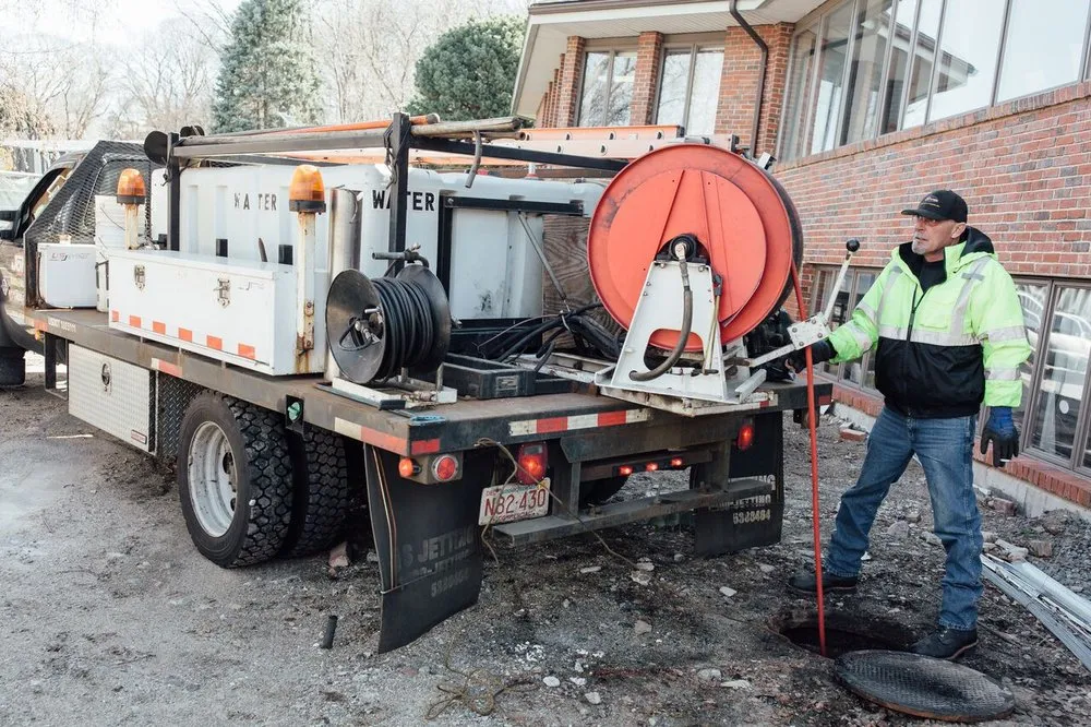 Slide of John's Sewer and Drain Cleaning