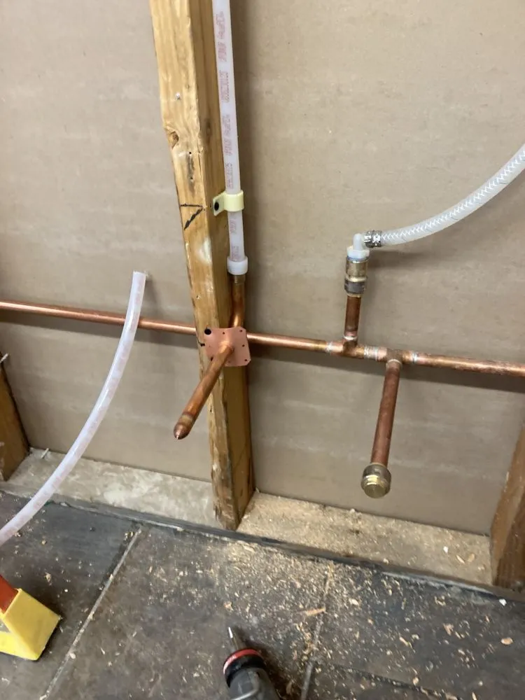 Slide of Jonny’s Plumbing