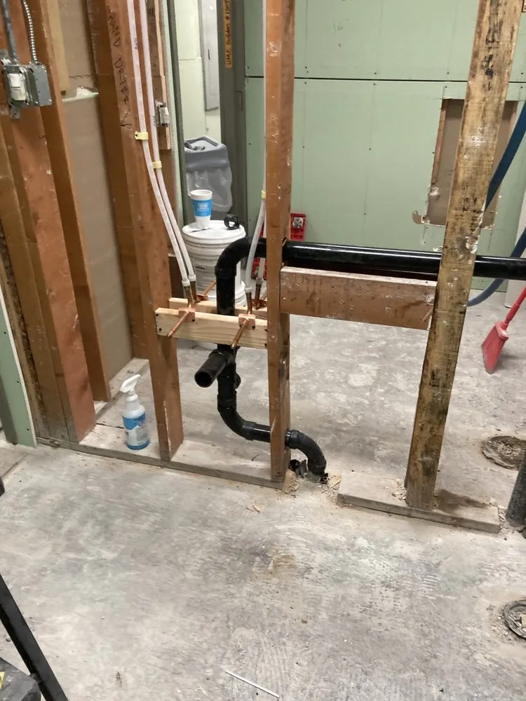 Slide of Jonny’s Plumbing