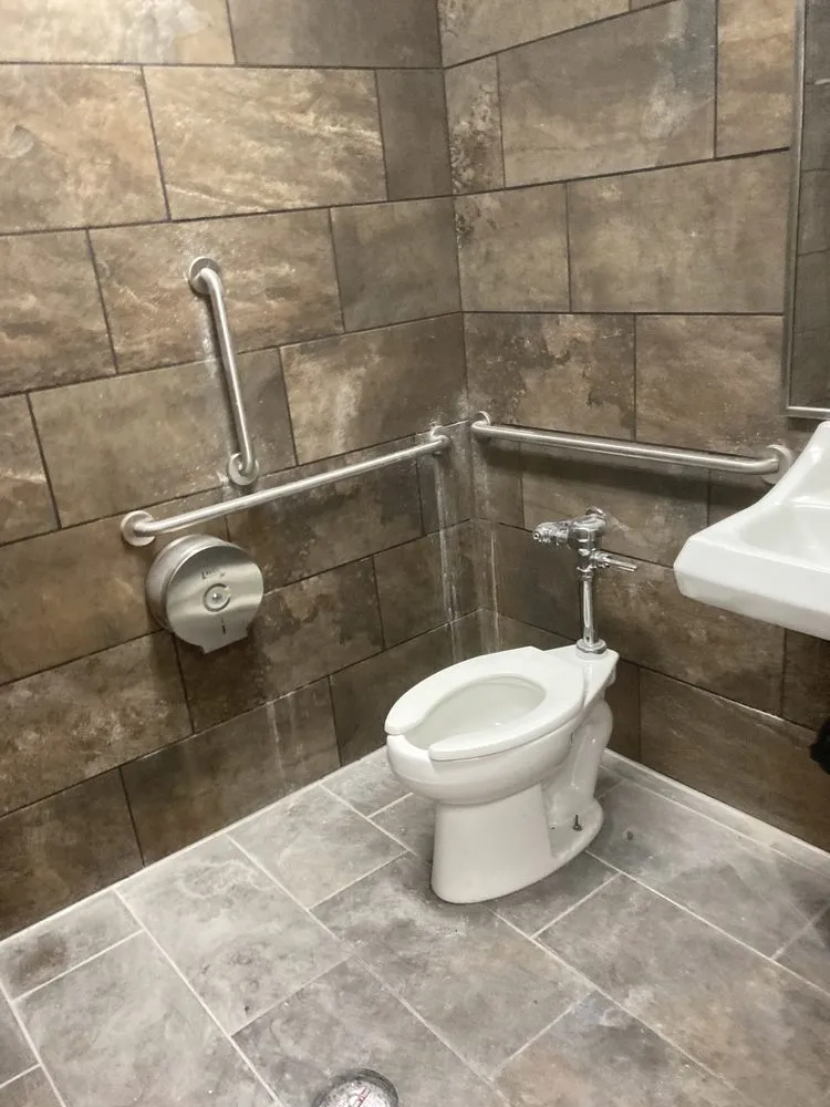 Slide of Jonny’s Plumbing