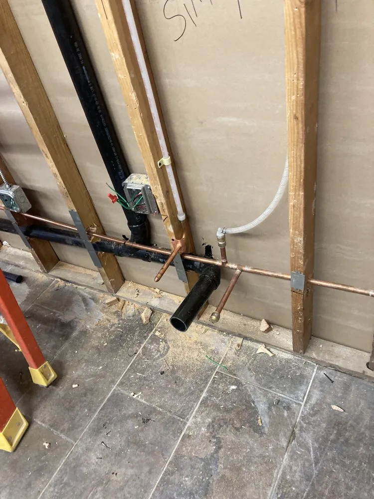 Slide of Jonny’s Plumbing