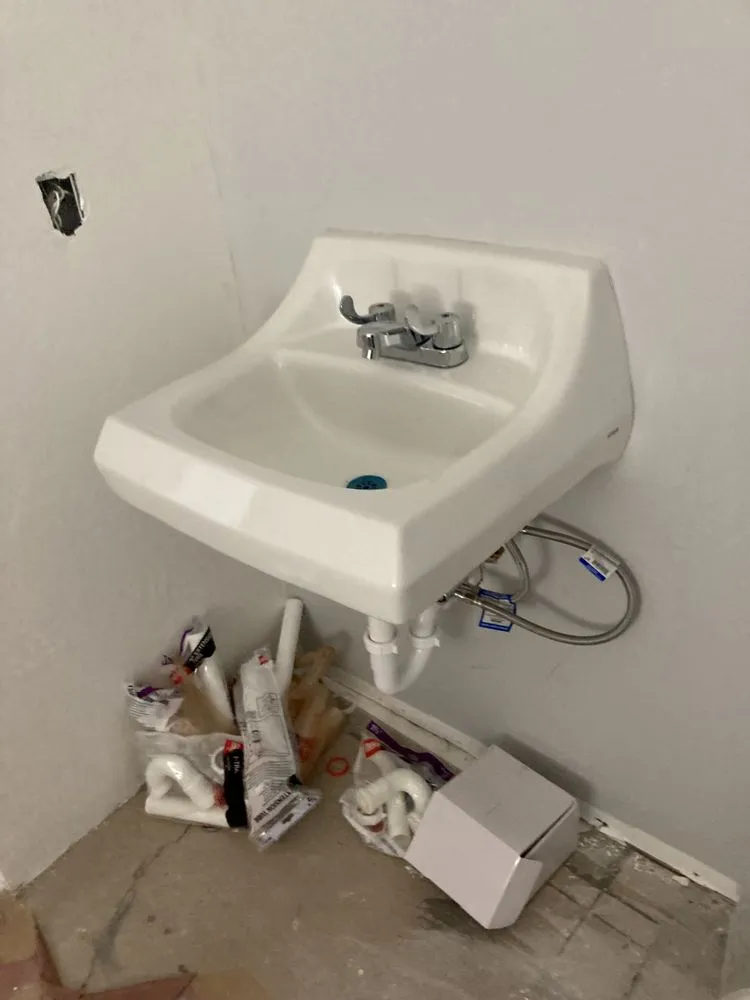 Slide of Jonny’s Plumbing