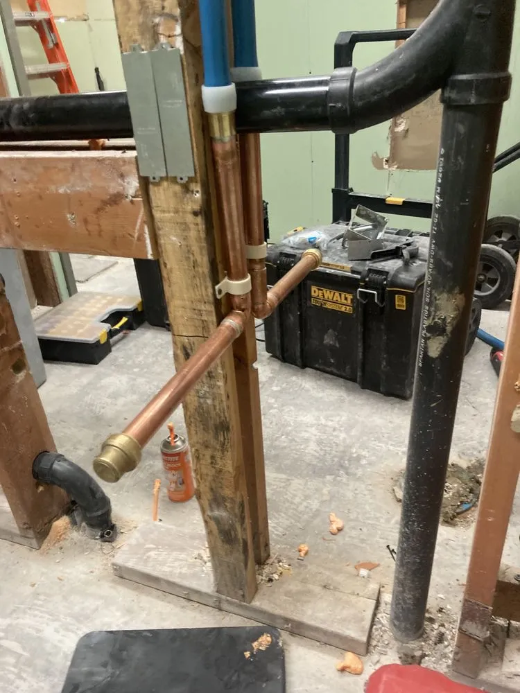 Slide of Jonny’s Plumbing