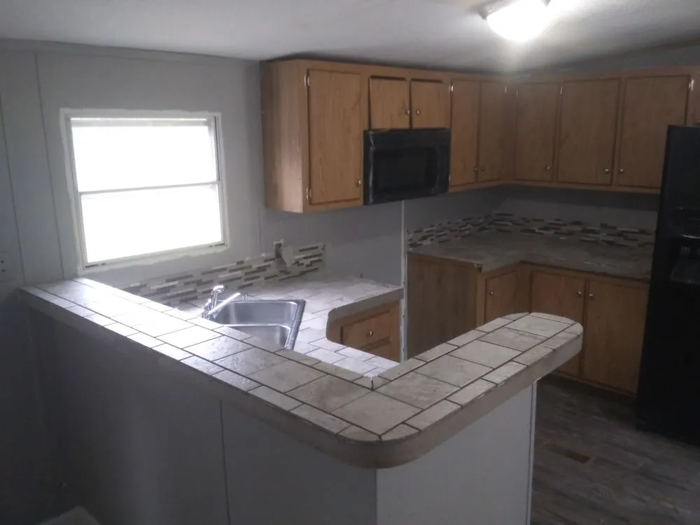 Slide of J's Custom Remodel An Home Repair