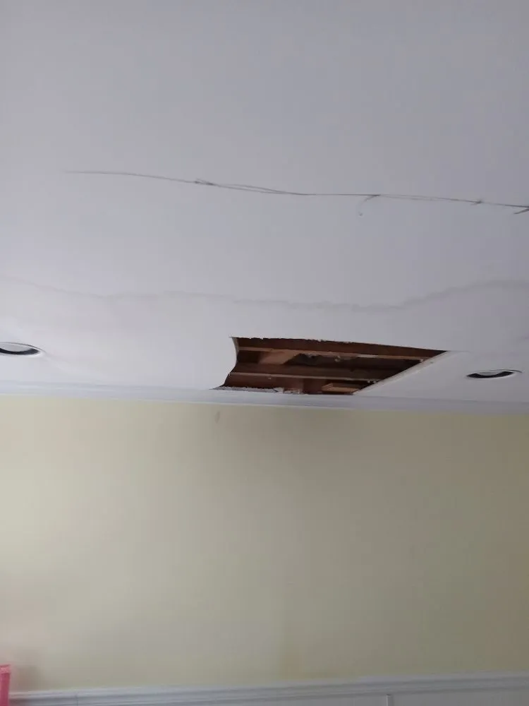 Slide of J&S handyman helping hands