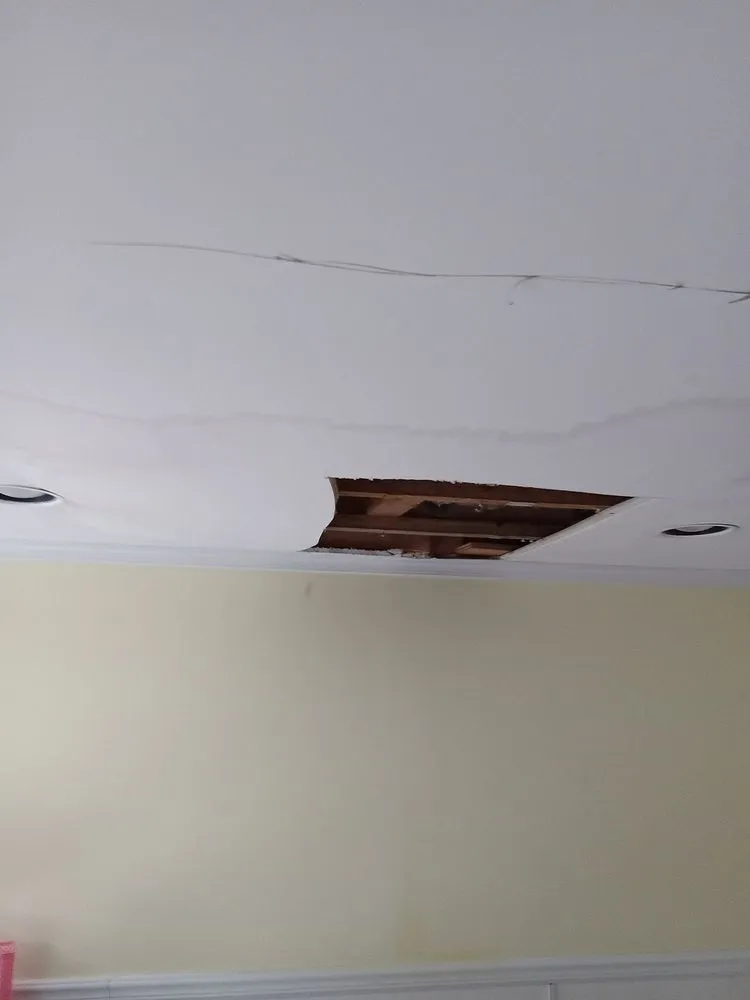 Slide of J&S handyman helping hands