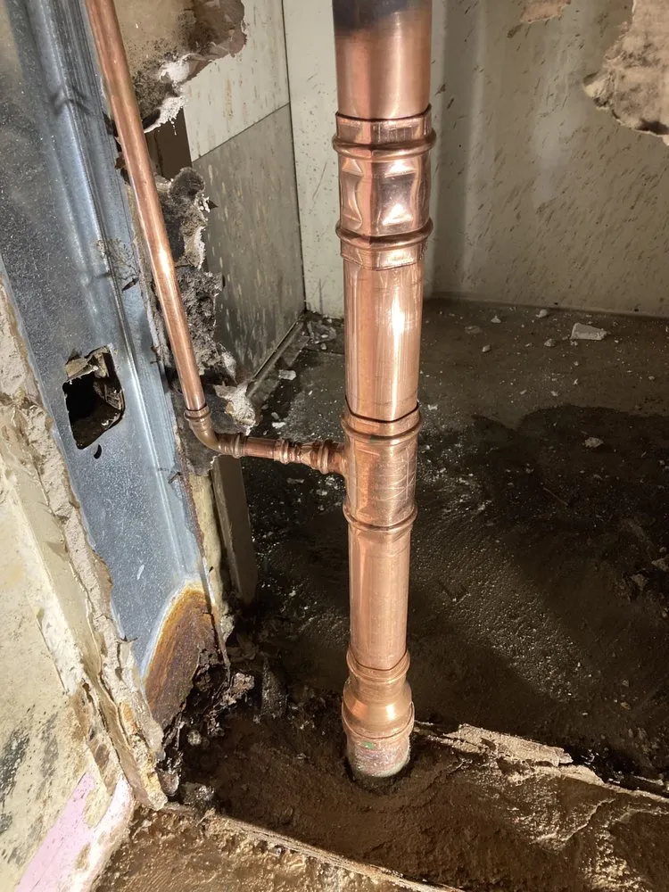 Slide of JS Plumbing & Drain Cleaning Services