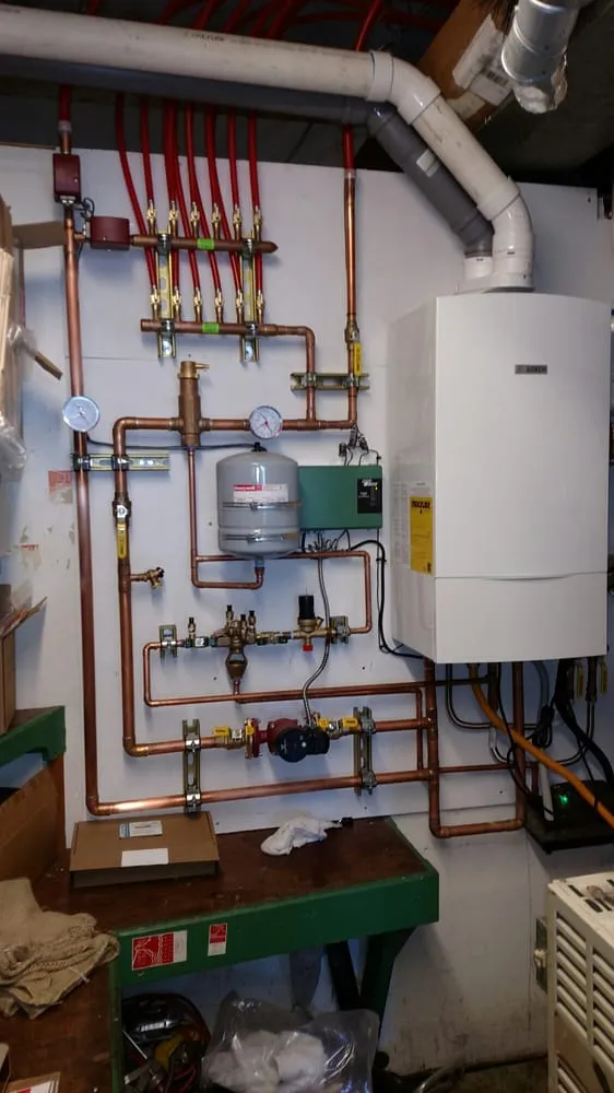 Slide of JT Plumbing and Radiant