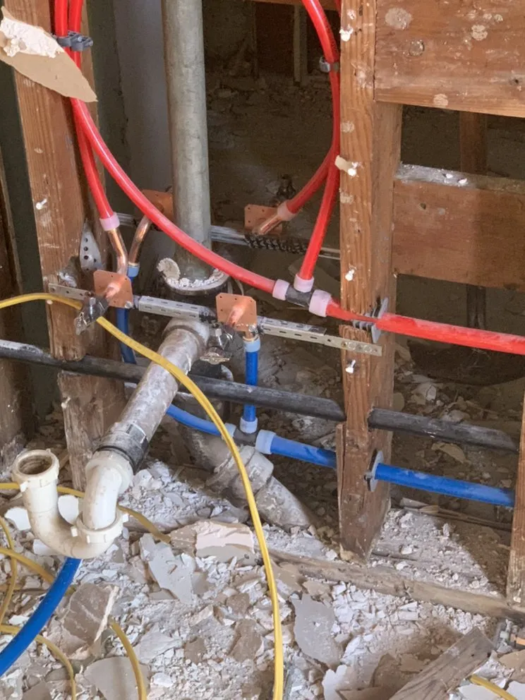 Slide of JT Plumbing and Rooter