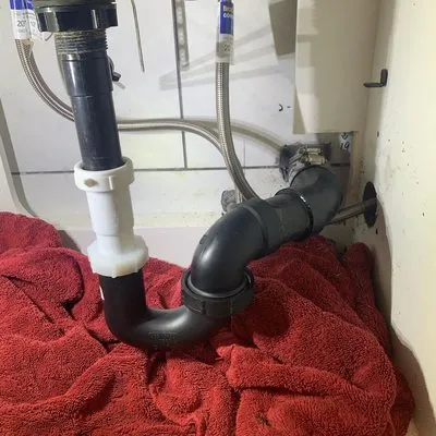 JT Plumbing and Rooter Logo