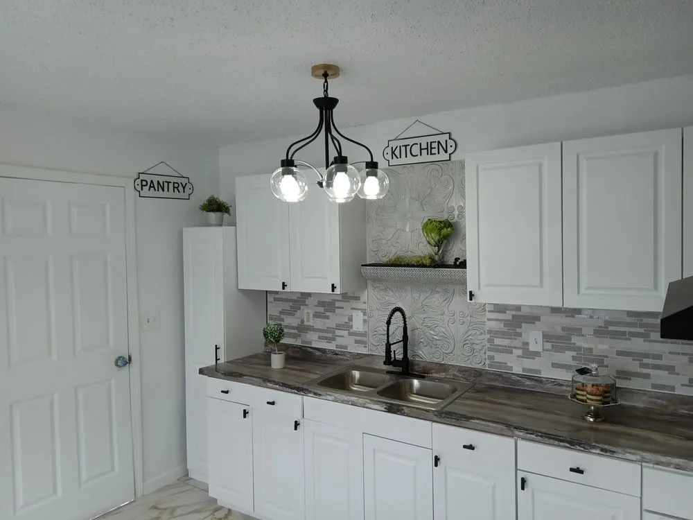 Slide of JT Reface Plumbing and Construction