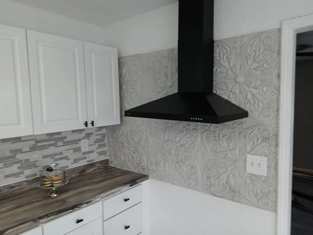 Slide of JT Reface Plumbing and Construction