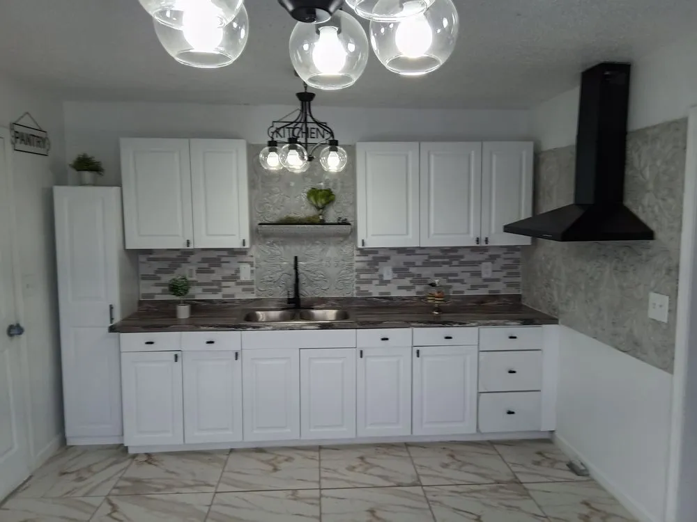 Slide of JT Reface Plumbing and Construction