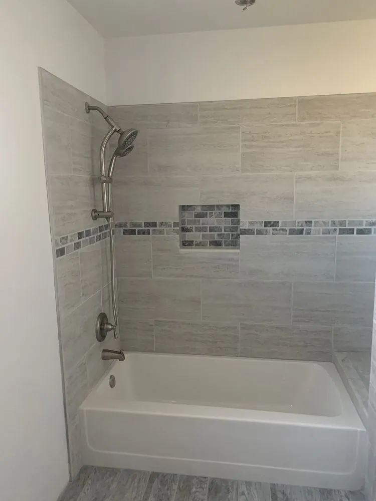 Slide of JTM Plumbing & Builder Contractor