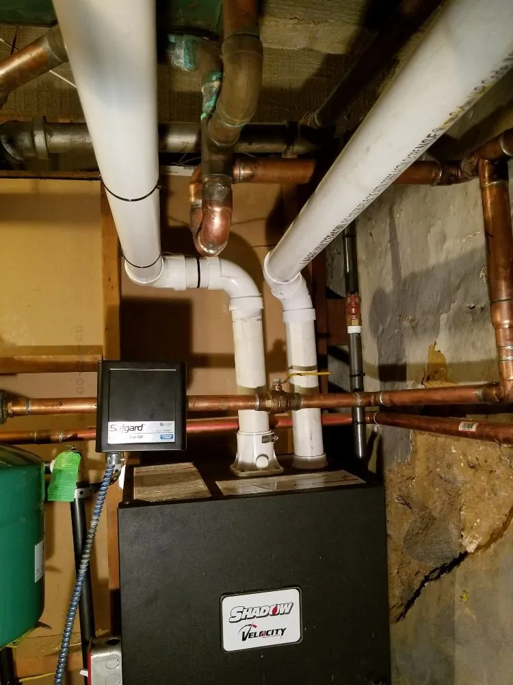 Slide of Just US Mechanics Plumbing Heating Air
