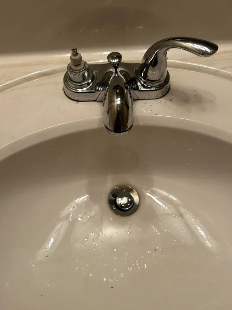 Slide of JustFlushIt Drain Cleaning and More