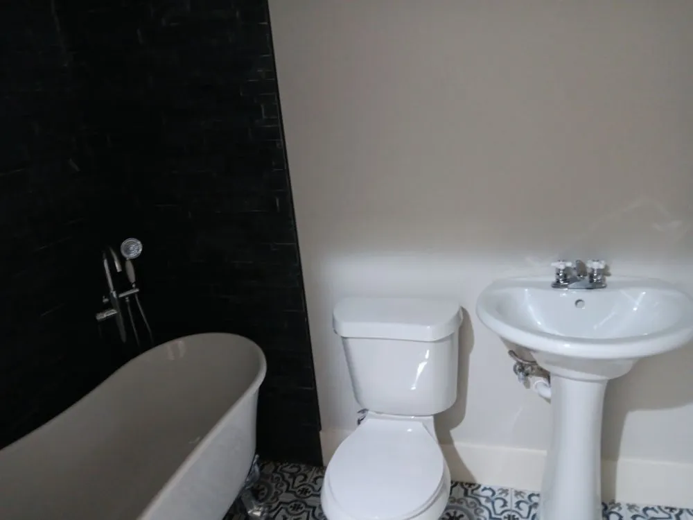 Slide of Justice Plumbing and Septic