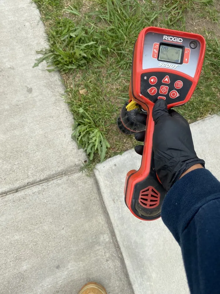 Slide of JV Rooter Service