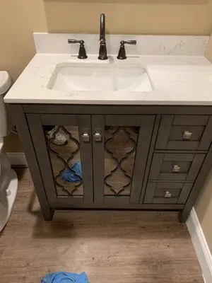 Ken Daniels Plumbing And Heating Logo