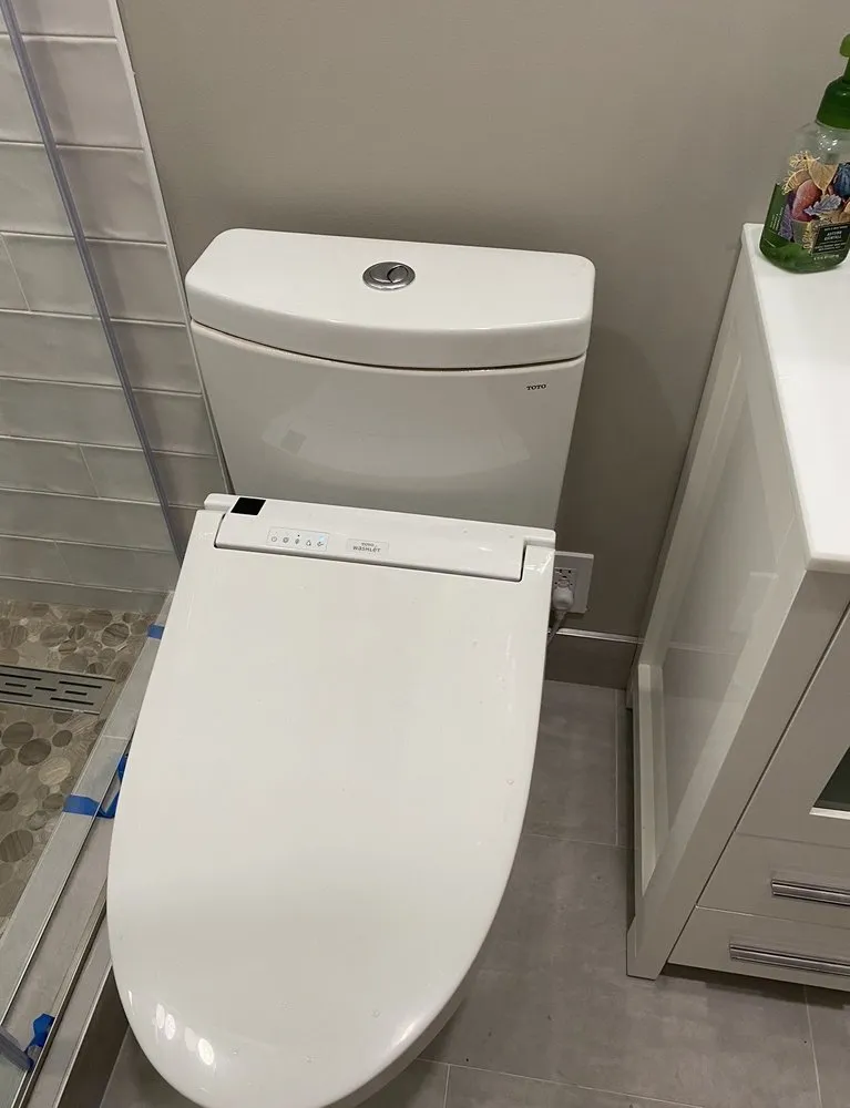 Slide of Kirill's Sink and Shower Repair