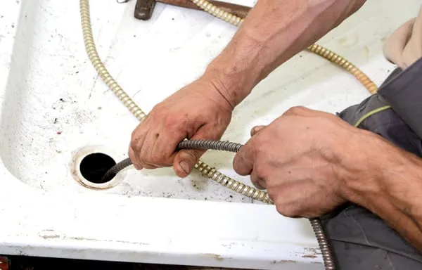 Klear Klogs Sewer & Drain Cleaning Service Logo