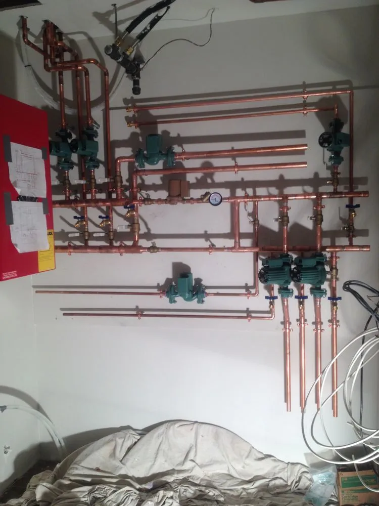 Slide of KMC Plumbing Service