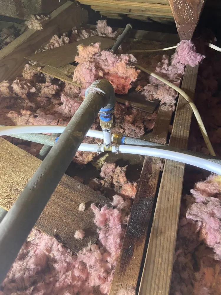 Slide of KT Plumbing of Spring