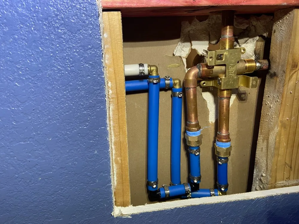 Slide of KT Plumbing of Spring