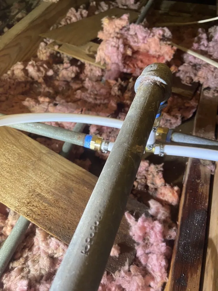 Slide of KT Plumbing of Spring