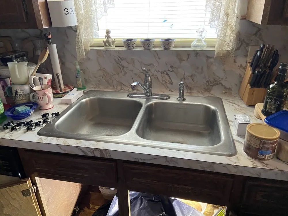 Slide of KT Plumbing of Spring