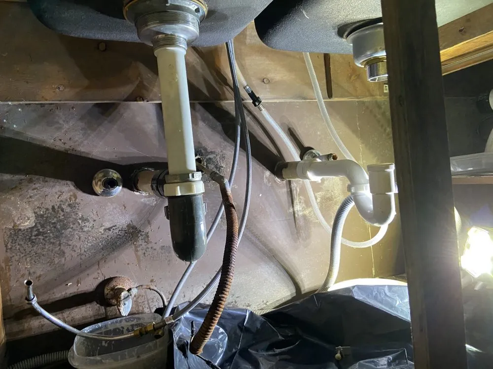 Slide of KT Plumbing of Spring