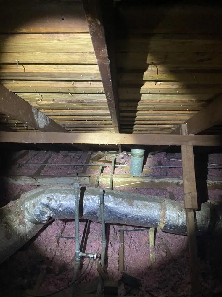 Slide of KT Plumbing of Spring