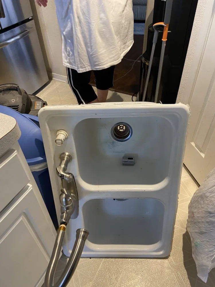 Slide of KT Plumbing of Spring