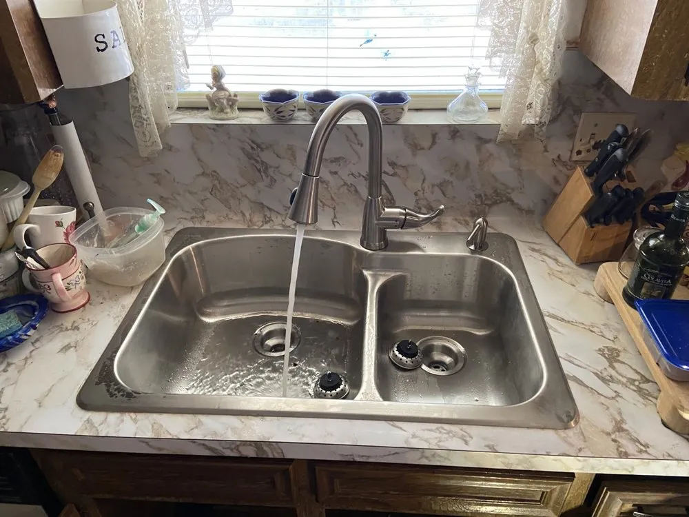 Slide of KT Plumbing of Spring